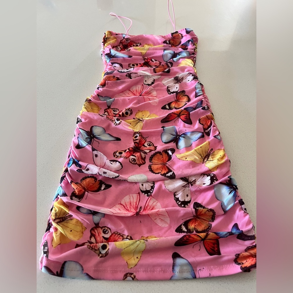 Woman pink fashion nova dress